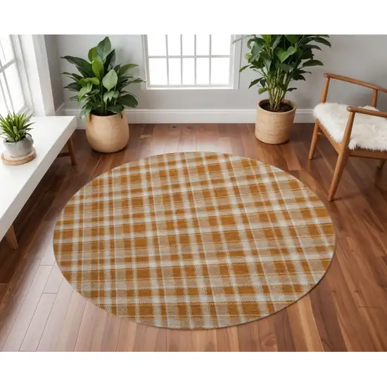 8' Rust And Ivory Plaid Washable Round Rug With UV Protection Photo 2