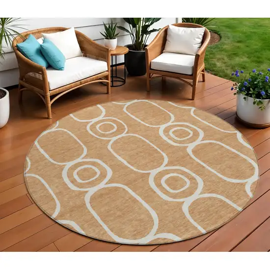 8' Rust And Ivory Round Geometric Washable Indoor Outdoor Area Rug Photo 1