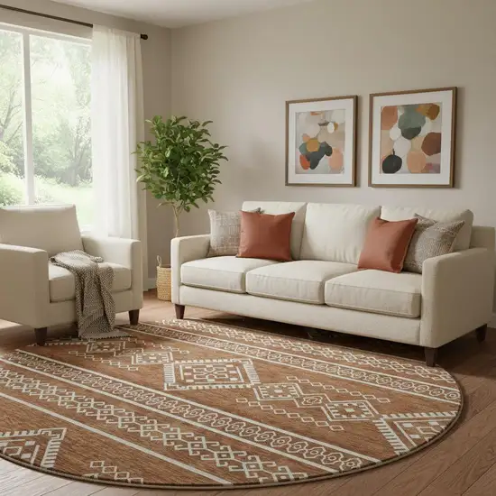 8' Rust And Ivory Southwestern Washable Round Rug With UV Protection Photo 1