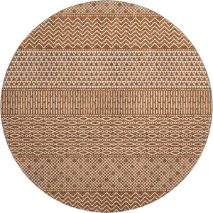 Photo of 8' Rust And Ivory Striped Washable Round Rug With UV Protection