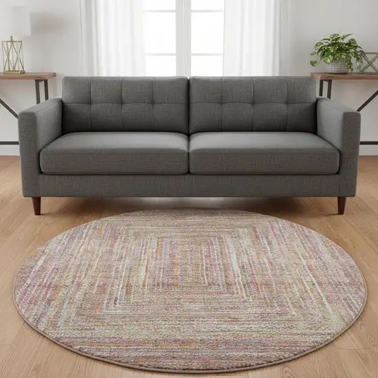 8' Rust And Mauve Geometric Washable Round Rug With UV Protection Photo 2