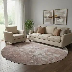 Photo of 8' Rust And Silver Abstract Washable Round Rug With UV Protection