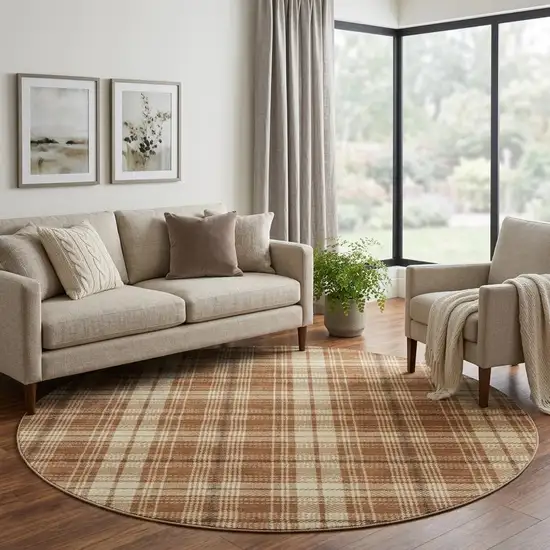 8' Rust Beige And Brown Plaid Washable Round Rug With UV Protection Photo 1