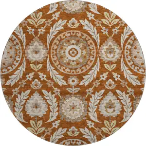 Photo of 8' Rust Beige And Gold Floral Washable Round Rug With UV Protection