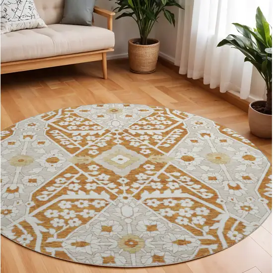 8' Rust Beige And Gold Floral Washable Round Rug With UV Protection Photo 1