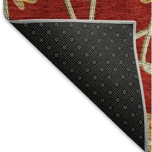 Photo of 8' Rust Beige And Gold Geometric Washable Round Rug With UV Protection