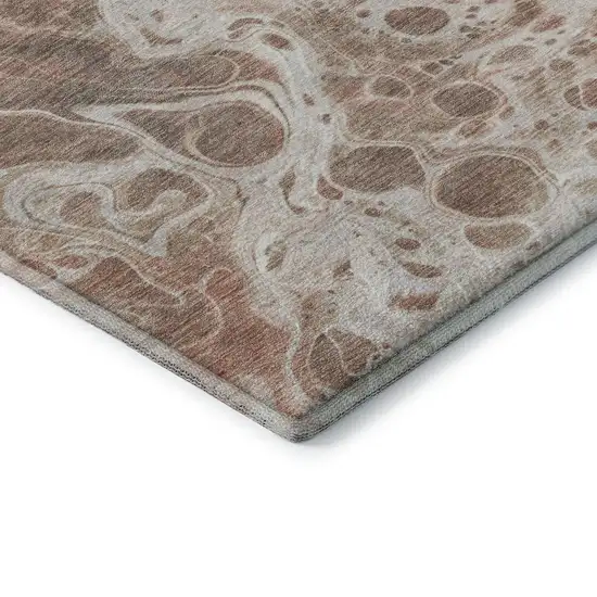 8' Rust Beige And Ivory Abstract Washable Round Rug With UV Protection Photo 6