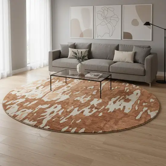 8' Rust Beige And Peach Abstract Washable Round Rug With UV Protection Photo 2