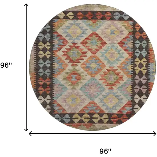 8' Rust Blue And Beige Tribal Washable Round Rug With UV Protection Photo 9