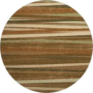 Photo of 8' Rust Brown And Copper Striped Washable Round Rug With UV Protection