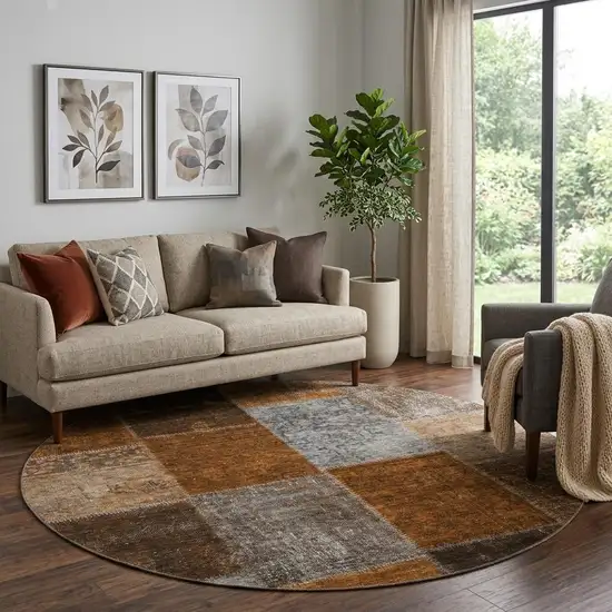 8' Rust Brown And Gray Patchwork Washable Round Rug With UV Protection Photo 1