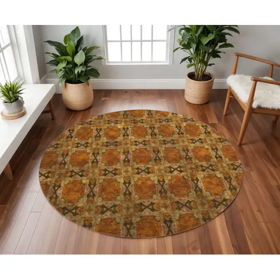 8' Rust Copper And Gold Floral Medallion Washable Round Rug With UV Protection Photo 2