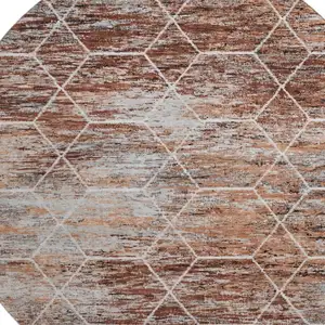 Photo of 8' Rust Copper And Ivory Geometric Washable Round Rug With UV Protection