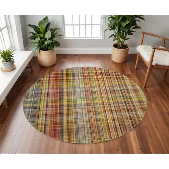 8' Rust Gold And Green Plaid Washable Round Rug With UV Protection Photo 2