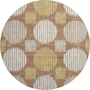 Photo of 8' Rust Gold And Ivory Geometric Washable Round Rug With UV Protection
