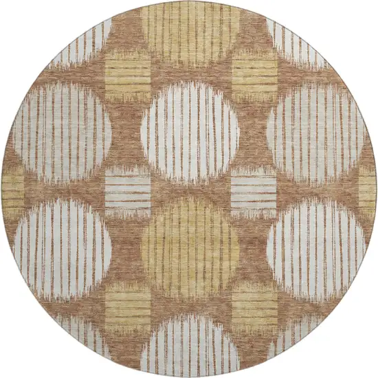8' Rust Gold And Ivory Geometric Washable Round Rug With UV Protection Photo 1