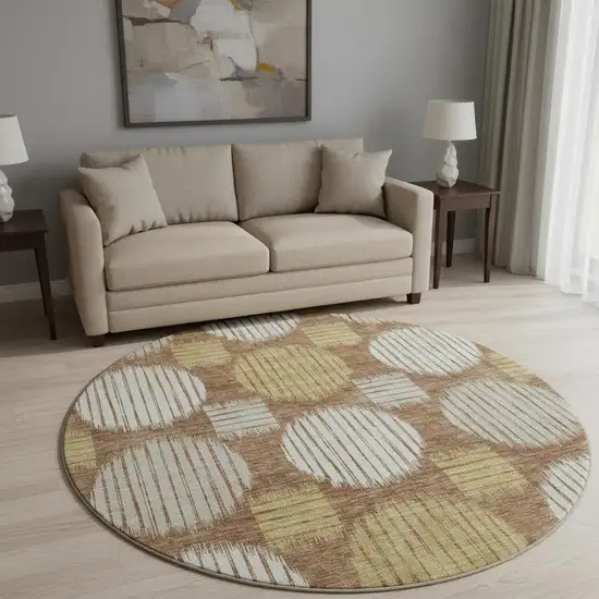 8' Rust Gold And Ivory Geometric Washable Round Rug With UV Protection Photo 2