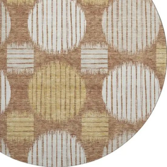 8' Rust Gold And Ivory Geometric Washable Round Rug With UV Protection Photo 3