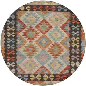 Photo of 8' Rust Gold And Orange Round Tribal Washable Indoor Outdoor Area Rug