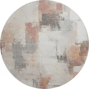 Photo of 8' Rust Gray And Ivory Abstract Washable Round Rug With UV Protection