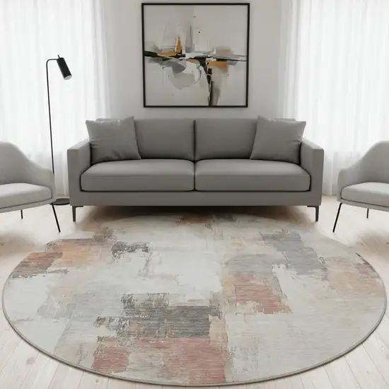 8' Rust Gray And Ivory Abstract Washable Round Rug With UV Protection Photo 2