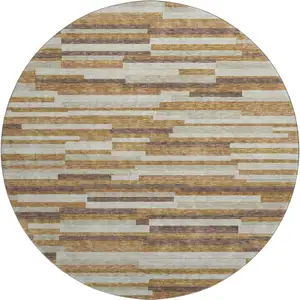 Photo of 8' Rust Ivory And Beige Striped Washable Round Rug With UV Protection
