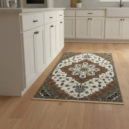 8' Rust Ivory And Black Medallion Runner Rug With Fringe Photo 1