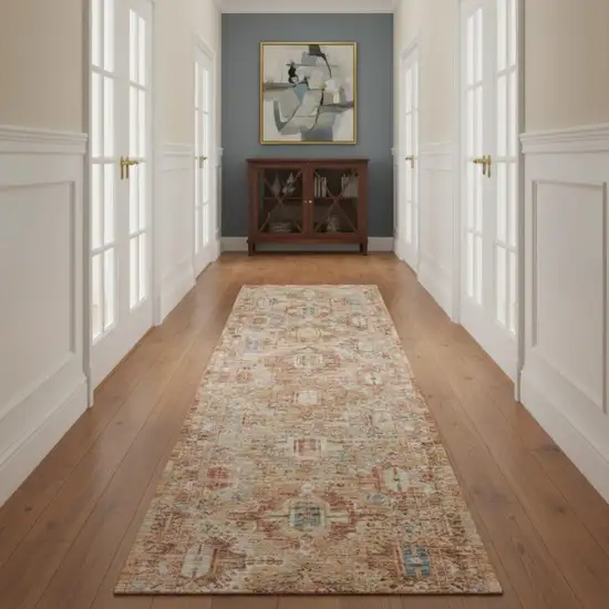 10' Rust Ivory And Blue Geometric Distressed Runner Rug Photo 1