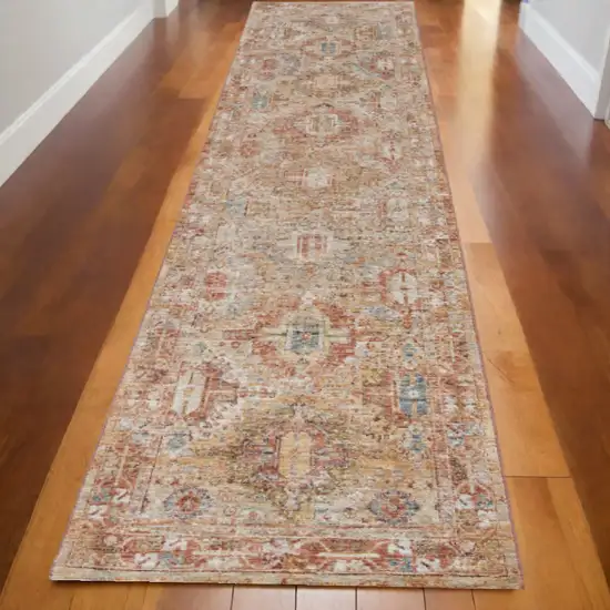 10' Rust Ivory And Blue Geometric Distressed Runner Rug Photo 1