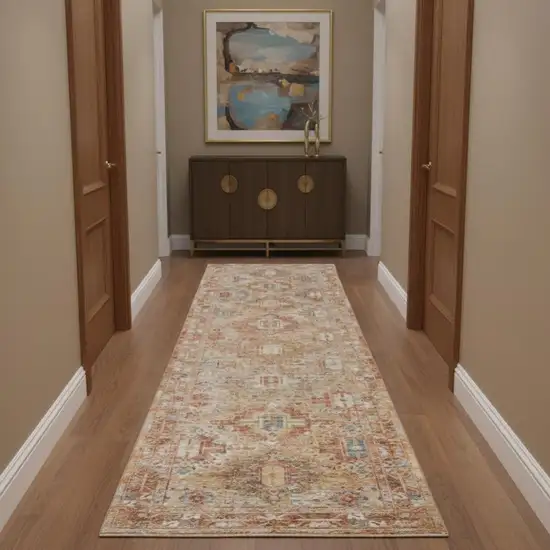 10' Rust Ivory And Blue Geometric Distressed Runner Rug Photo 1