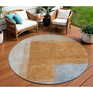 Photo of 8' Rust Ivory And Blue Round Abstract Washable Indoor Outdoor Area Rug