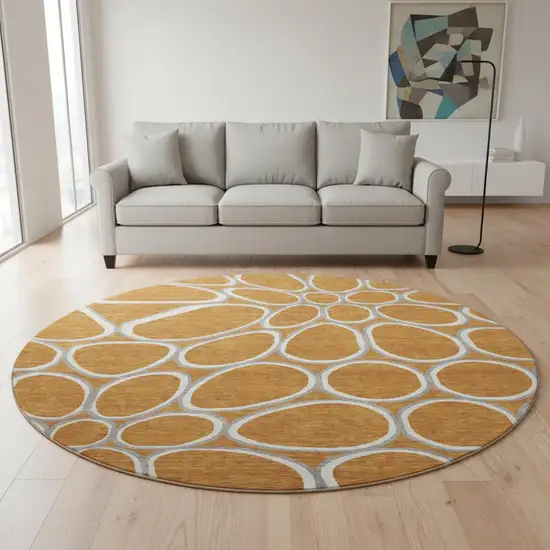 8' Rust Ivory And Gray Geometric Washable Round Rug With UV Protection Photo 2