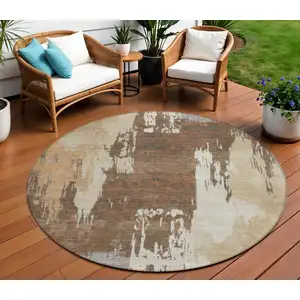 Photo of 8' Rust Ivory And Gray Round Abstract Washable Indoor Outdoor Area Rug