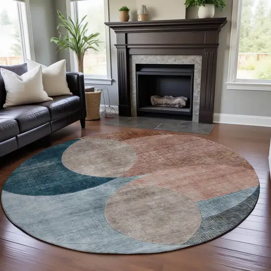 8' Rust Teal And Beige Geometric Washable Round Rug With UV Protection Photo 4