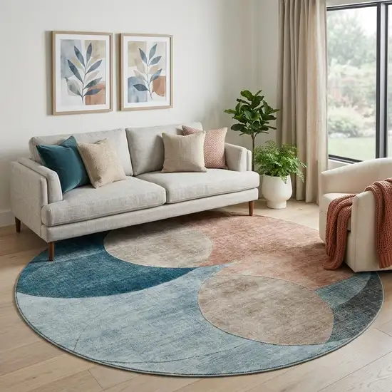 8' Rust Teal And Beige Geometric Washable Round Rug With UV Protection Photo 1