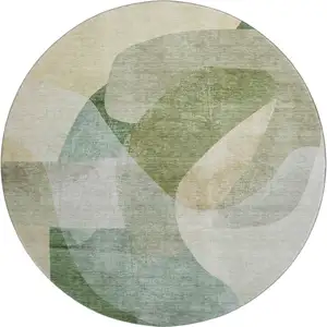 Photo of 8' Sage And Beige Abstract Washable Round Rug With UV Protection