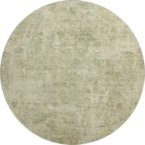 Photo of 8' Sage And Beige Abstract Washable Round Rug With UV Protection