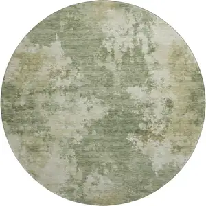 Photo of 8' Sage And Beige Abstract Washable Round Rug With UV Protection