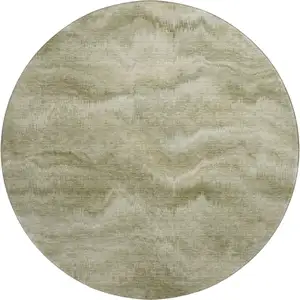 Photo of 8' Sage And Beige Abstract Washable Round Rug With UV Protection