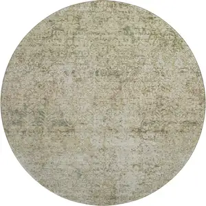 Photo of 8' Sage And Beige Abstract Washable Round Rug With UV Protection