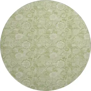 Photo of 8' Sage And Beige Floral Washable Round Rug With UV Protection
