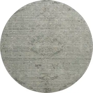 Photo of 8' Sage And Beige Medallion Washable Round Rug With UV Protection
