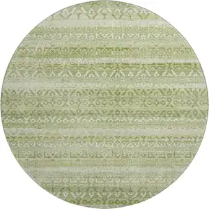 Photo of 8' Sage And Beige Striped Washable Round Rug With UV Protection