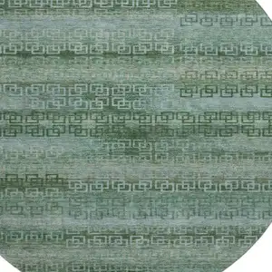 Photo of 8' Sage And Blue Striped Washable Round Rug With UV Protection