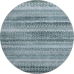 Photo of 8' Sage And Blue Striped Washable Round Rug With UV Protection