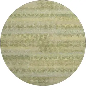 Photo of 8' Sage And Gold Striped Washable Round Rug With UV Protection