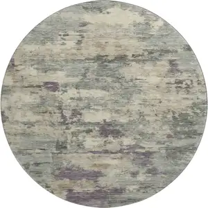 Photo of 8' Sage And Gray Abstract Washable Round Rug With UV Protection