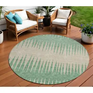 Photo of 8' Sage And Gray Round Striped Washable Indoor Outdoor Area Rug