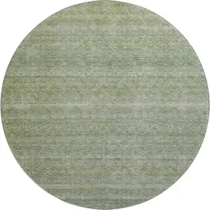Photo of 8' Sage And Gray Striped Washable Round Rug With UV Protection
