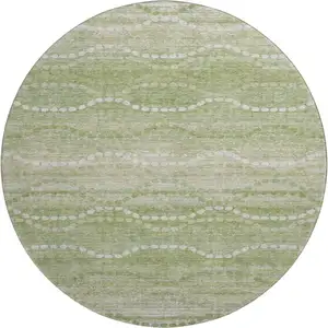Photo of 8' Sage And Ivory Abstract Geometric Washable Round Rug With UV Protection
